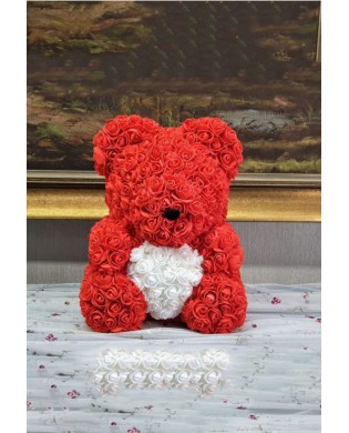 Red teddy bear made of roses